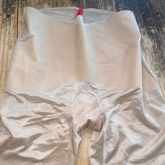 SPANX Other - Spanx
SKINNY BRITCHES - Shape wear size small crisscross front for flat tummy